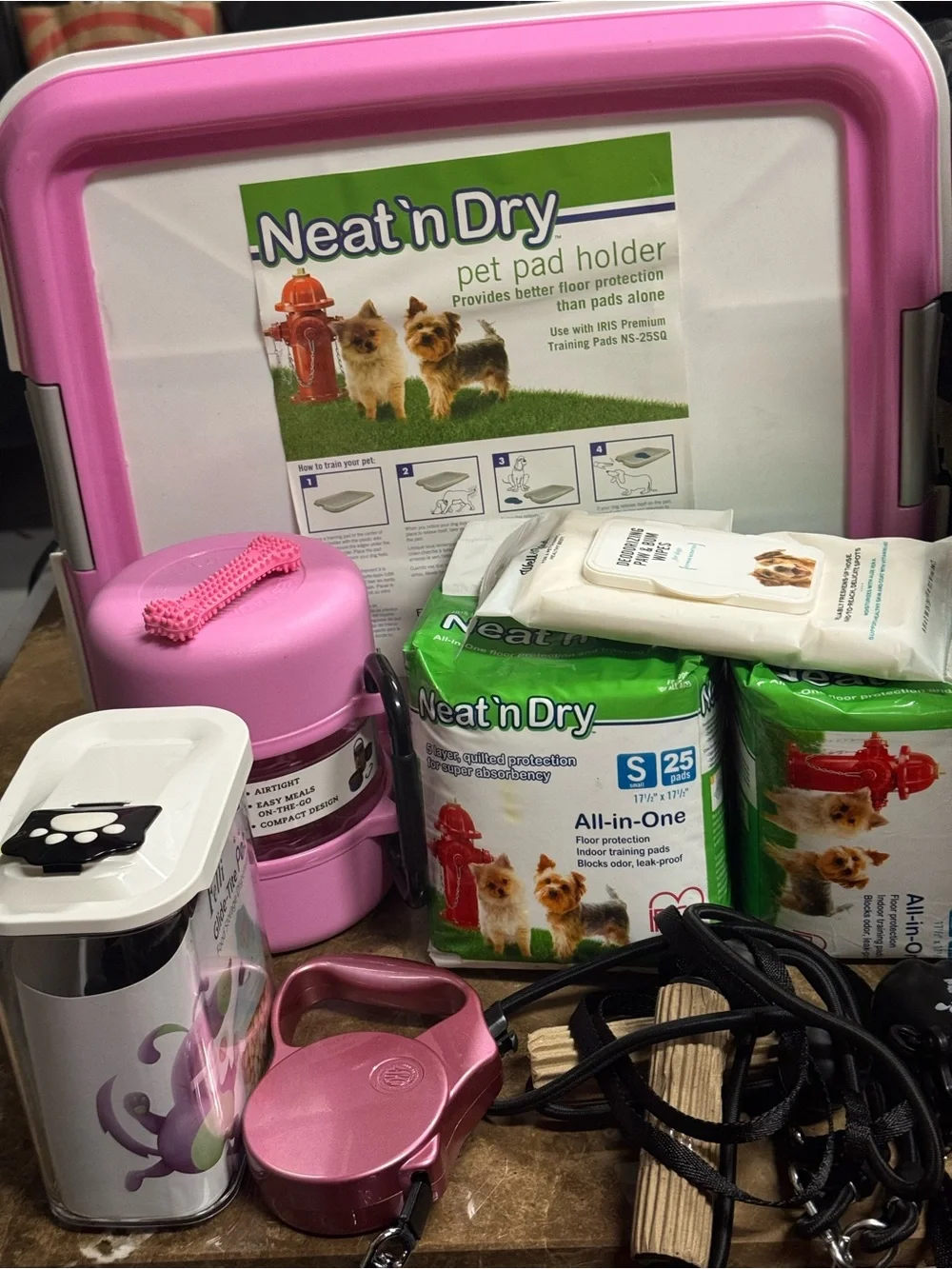 Lot of Pet accessories:Pad Holder,Leash,waste bags,retractabl leash,food storage